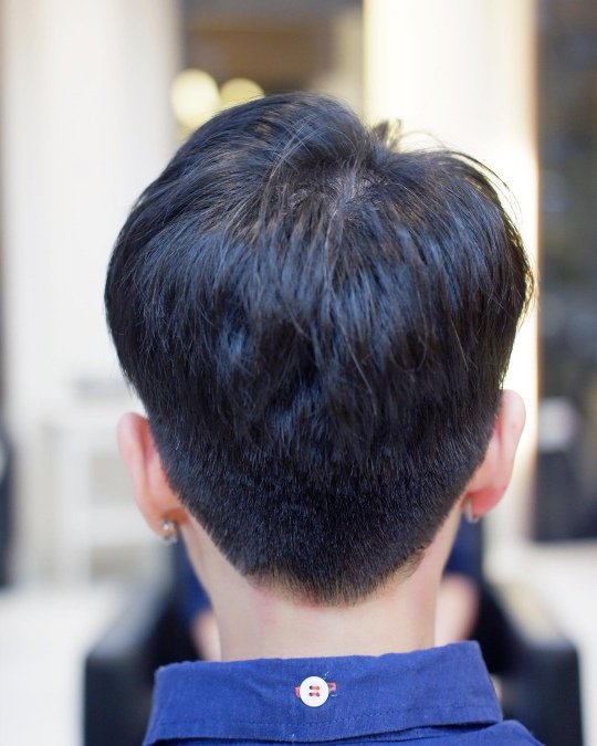 Back View: Rounded Crown + Tight Taper
