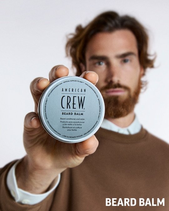 Beard Balm Tin Held to the Camera